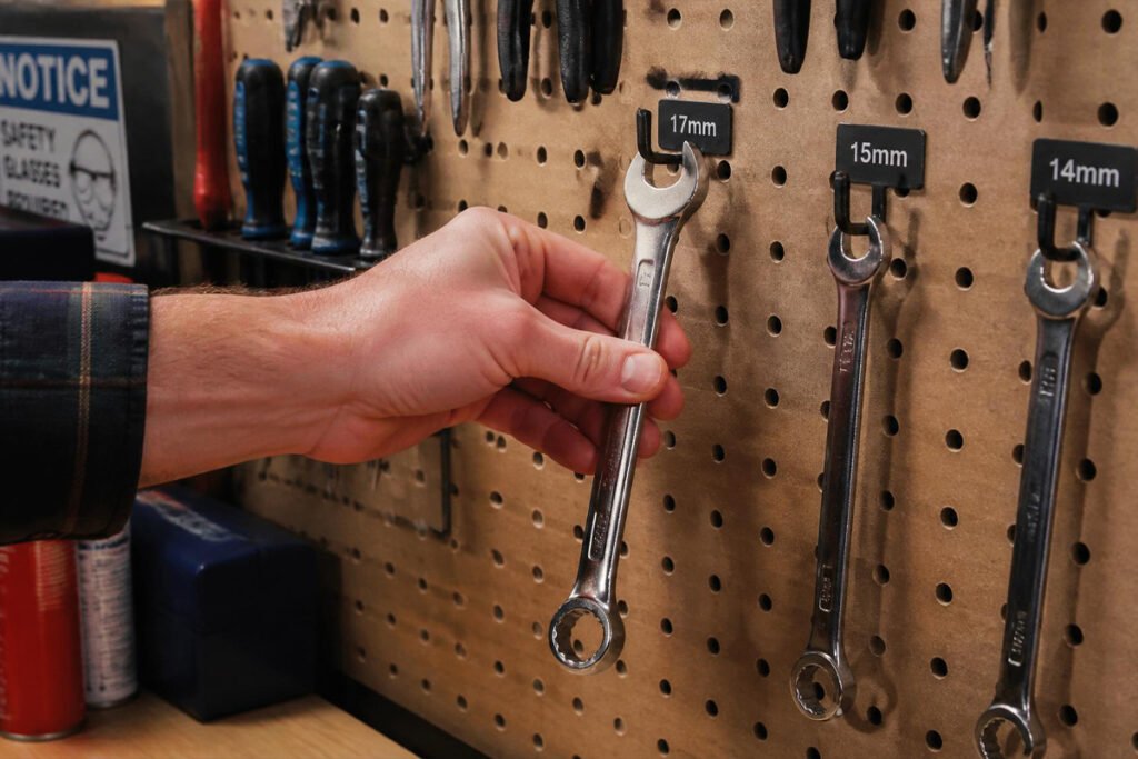 comparison of five garage hand tool sets on workbench