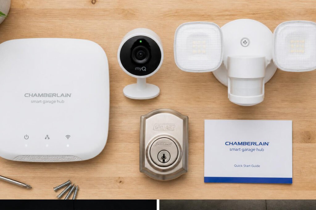 garage security devices flat lay including smart hub camera and motion light
