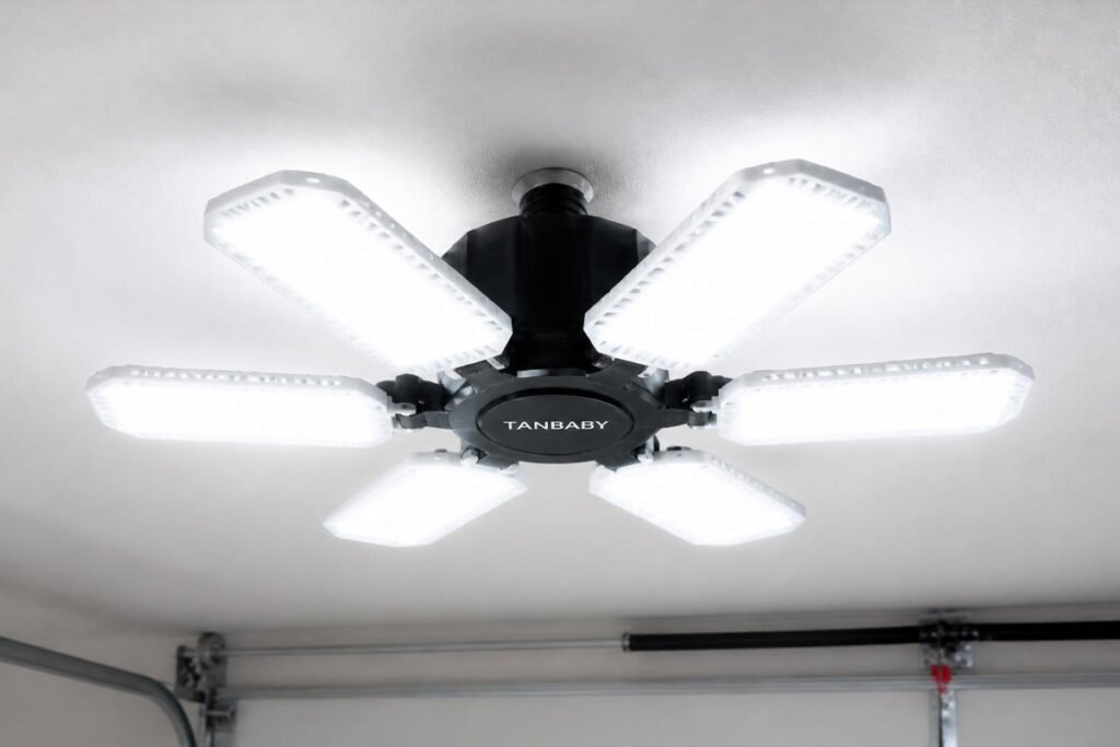 AUDLES budget panel light screwed into a simple porcelain fixture, single-car garage
